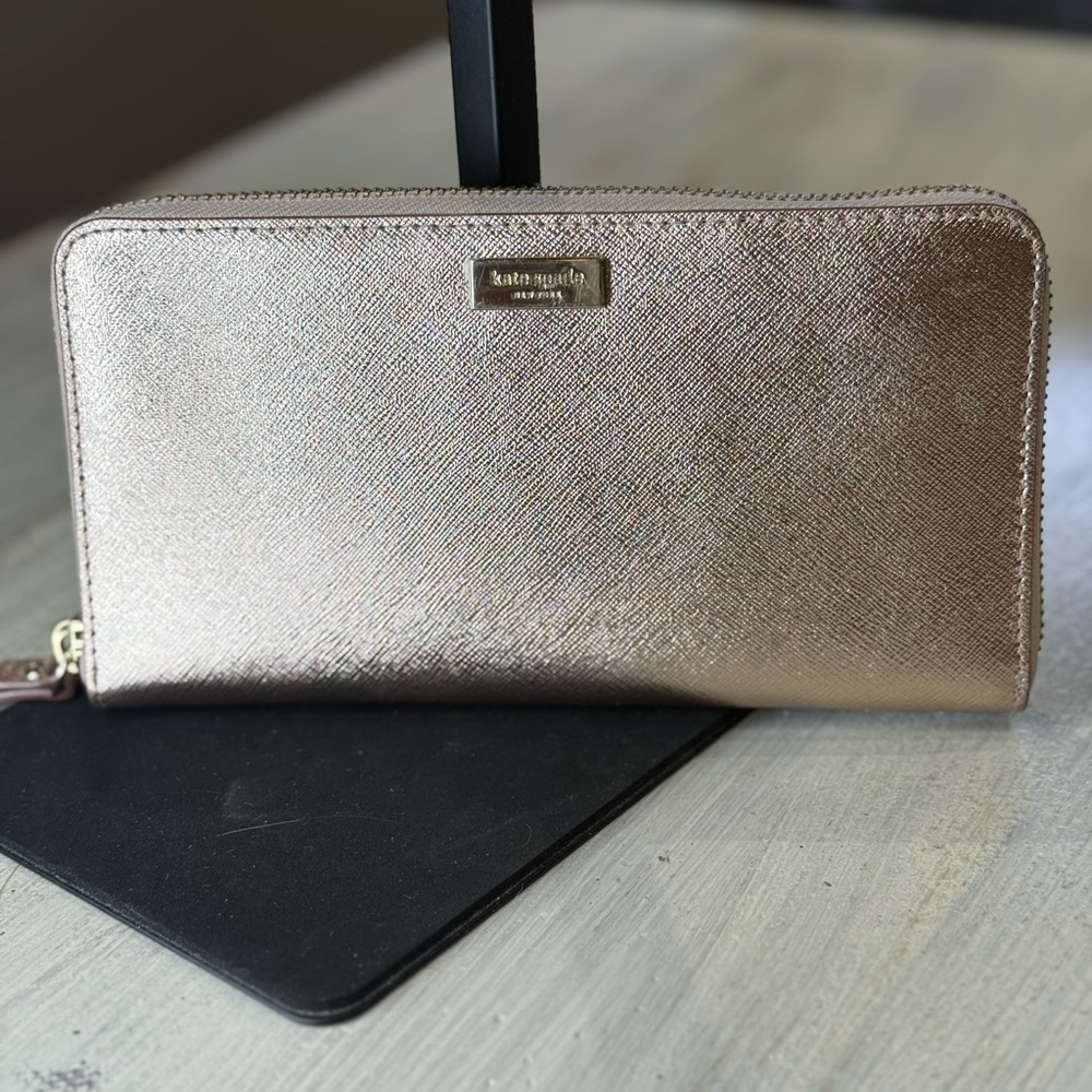 kate spade metallic rose gold zip-around wallet NWOT